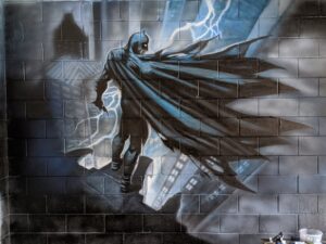 A Batman painting on the wall